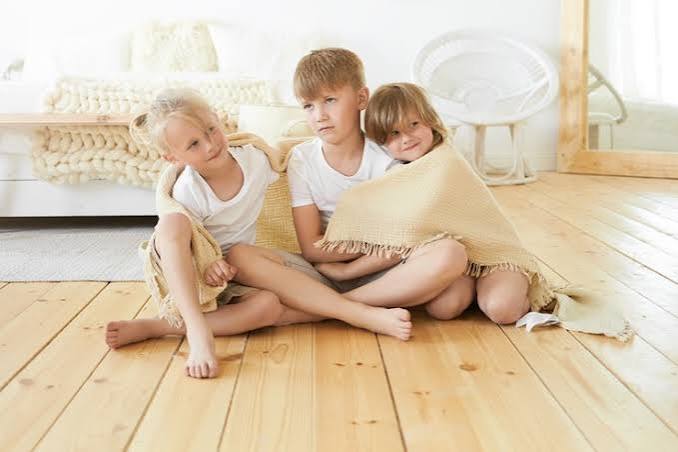 Children playing together at home