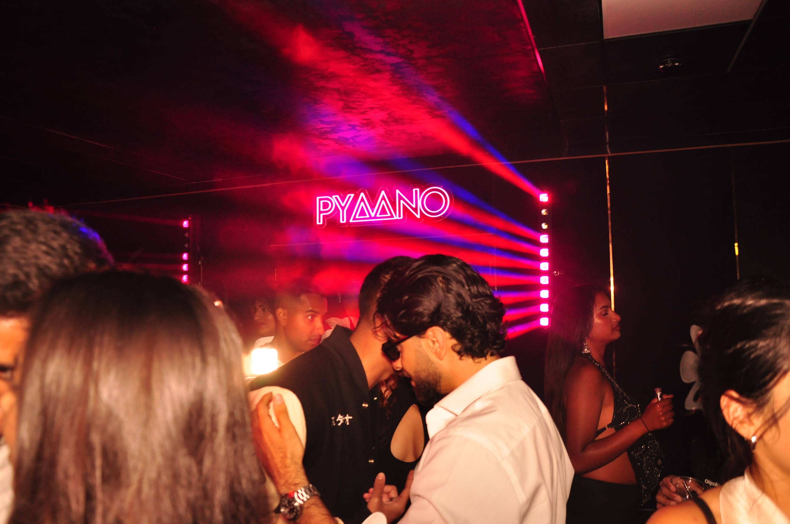 Audience gathered around a performer