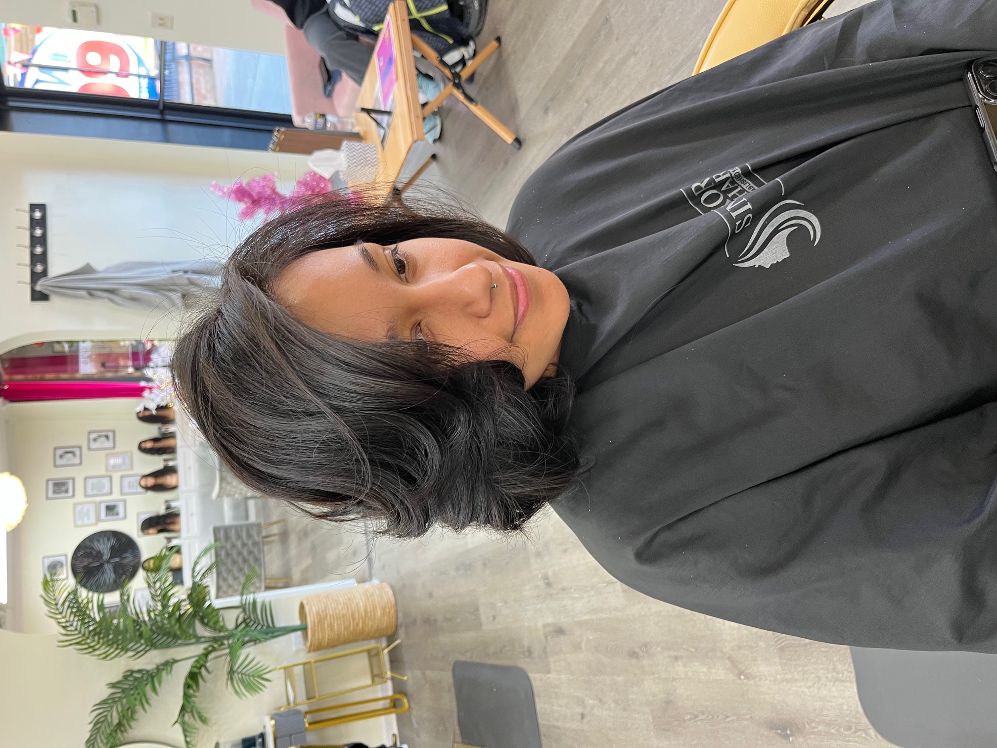Natural hair silk press — smooth and shiny at Sinkor Beauty